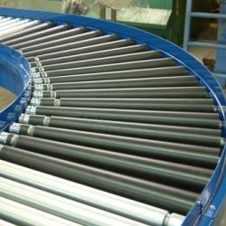 Line shaft conveyor bend